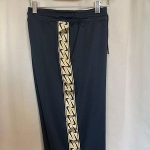 Nike Vintage Jogger Pants Black & Gold Nike Logo front Sides.  Mint Condition